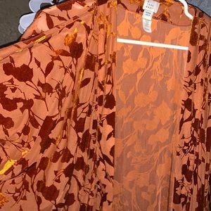 A NEW DAY shawl will fit most